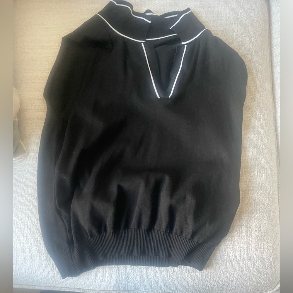 Black Sleeveless Top with White Trim